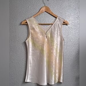 Patal Cream Sleeveless Blouse With Embossed Design